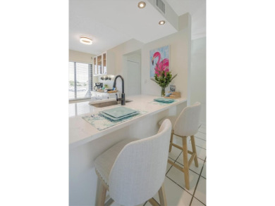 TOP FLOOR, END UNIT! Discover a slice of paradise at 6372 Palma on Isla Del Sol Yacht and Country Club in Florida - for sale on GolfHomes.com, golf home, golf lot