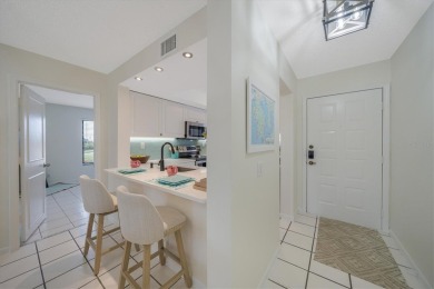 TOP FLOOR, END UNIT! Discover a slice of paradise at 6372 Palma on Isla Del Sol Yacht and Country Club in Florida - for sale on GolfHomes.com, golf home, golf lot