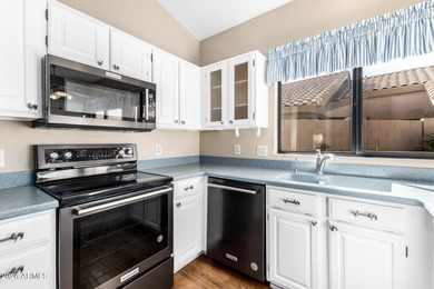 Location ! Overlooking the one-of-a-kind moat in the unique on Westbrook Village Golf Club in Arizona - for sale on GolfHomes.com, golf home, golf lot