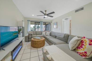 TOP FLOOR, END UNIT! Discover a slice of paradise at 6372 Palma on Isla Del Sol Yacht and Country Club in Florida - for sale on GolfHomes.com, golf home, golf lot