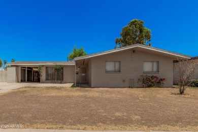 Fantastic opportunity to own this charming single-level home! on Maryvale Golf Course in Arizona - for sale on GolfHomes.com, golf home, golf lot