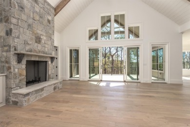 This exquisite new home in the prestigious Richland Pointe on Reynolds Lake Oconee - The Oconee in Georgia - for sale on GolfHomes.com, golf home, golf lot