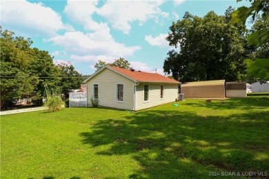 Lake views and peace surround this adorable home. Step into your on Indian Rock Golf Club in Missouri - for sale on GolfHomes.com, golf home, golf lot