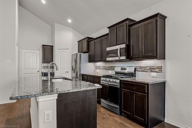 Welcome to your new home in Oak Creek Trails! Inside, you'll on The Golf Club At Champions Circle in Texas - for sale on GolfHomes.com, golf home, golf lot