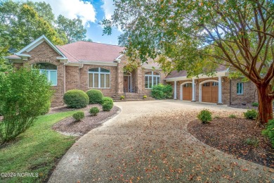 Discover luxury and tranquility at 234 Beech Point Dr., nestled on Sound Golf Links at Albemarle Plantation in North Carolina - for sale on GolfHomes.com, golf home, golf lot