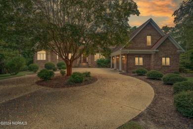 Discover luxury and tranquility at 234 Beech Point Dr., nestled on Sound Golf Links at Albemarle Plantation in North Carolina - for sale on GolfHomes.com, golf home, golf lot