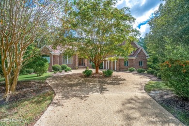 Discover luxury and tranquility at 234 Beech Point Dr., nestled on Sound Golf Links at Albemarle Plantation in North Carolina - for sale on GolfHomes.com, golf home, golf lot