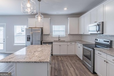 Welcome home to this stunning residence nestled in the desirable on Traditions of Braselton Golf Club in Georgia - for sale on GolfHomes.com, golf home, golf lot