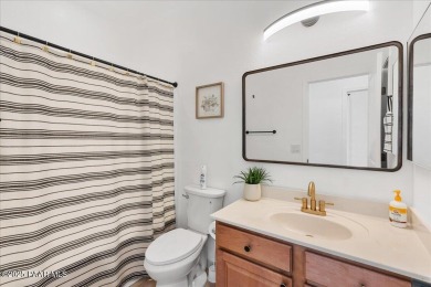 Beautifully updated contemporary home, with mountain views in a on StoneRidge Golf Course in Arizona - for sale on GolfHomes.com, golf home, golf lot