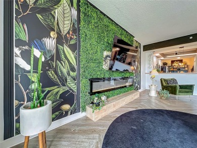This one is EPIC!! Convenient, maintenance free living near all on MetroWest Golf Club in Florida - for sale on GolfHomes.com, golf home, golf lot