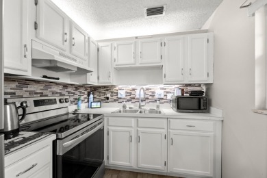 This well kept corner unit offers 1 bed, 1.5 bath- just steps on The American Golf Club in Florida - for sale on GolfHomes.com, golf home, golf lot