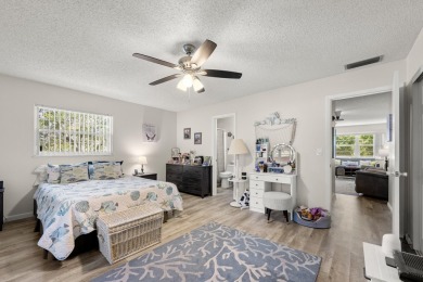 This well kept corner unit offers 1 bed, 1.5 bath- just steps on The American Golf Club in Florida - for sale on GolfHomes.com, golf home, golf lot