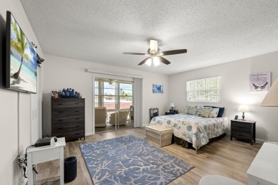 This well kept corner unit offers 1 bed, 1.5 bath- just steps on The American Golf Club in Florida - for sale on GolfHomes.com, golf home, golf lot