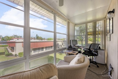 This well kept corner unit offers 1 bed, 1.5 bath- just steps on The American Golf Club in Florida - for sale on GolfHomes.com, golf home, golf lot