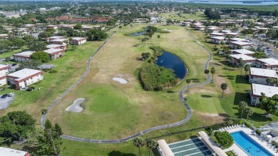 This well kept corner unit offers 1 bed, 1.5 bath- just steps on The American Golf Club in Florida - for sale on GolfHomes.com, golf home, golf lot