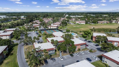 This well kept corner unit offers 1 bed, 1.5 bath- just steps on The American Golf Club in Florida - for sale on GolfHomes.com, golf home, golf lot