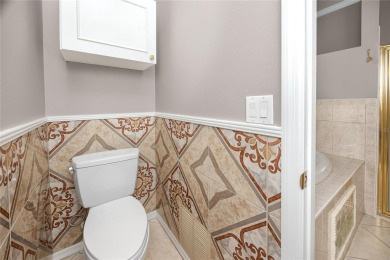 Step into timeless elegance and modern comfort in this on East Lake Woodlands Country Club in Florida - for sale on GolfHomes.com, golf home, golf lot