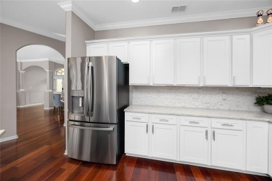 Step into timeless elegance and modern comfort in this on East Lake Woodlands Country Club in Florida - for sale on GolfHomes.com, golf home, golf lot
