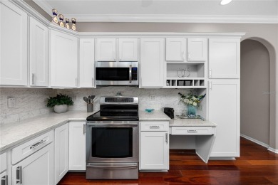 Step into timeless elegance and modern comfort in this on East Lake Woodlands Country Club in Florida - for sale on GolfHomes.com, golf home, golf lot