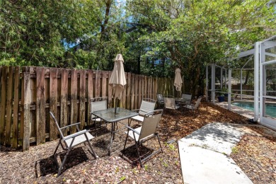 Under contract-accepting backup offers. Step into timeless on East Lake Woodlands Country Club in Florida - for sale on GolfHomes.com, golf home, golf lot