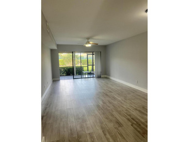 First-floor, fully updated condo with beautiful views and true on The Golf Club of Jupiter in Florida - for sale on GolfHomes.com, golf home, golf lot