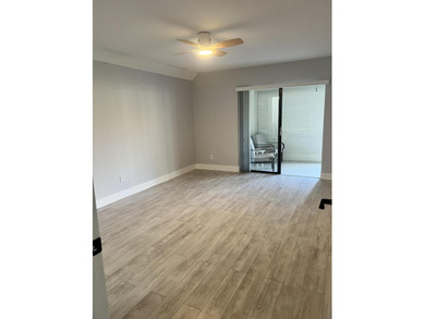 First-floor, fully updated condo with beautiful views and true on The Golf Club of Jupiter in Florida - for sale on GolfHomes.com, golf home, golf lot