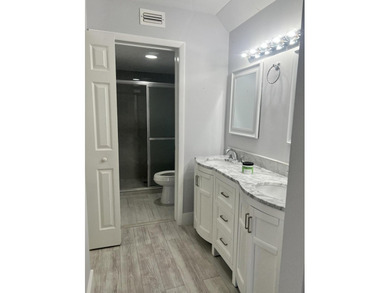 First-floor, fully updated condo with beautiful views and true on The Golf Club of Jupiter in Florida - for sale on GolfHomes.com, golf home, golf lot