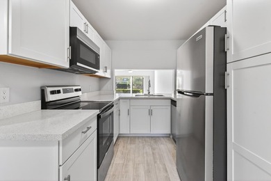 First-floor, fully updated condo with beautiful views and true on The Golf Club of Jupiter in Florida - for sale on GolfHomes.com, golf home, golf lot