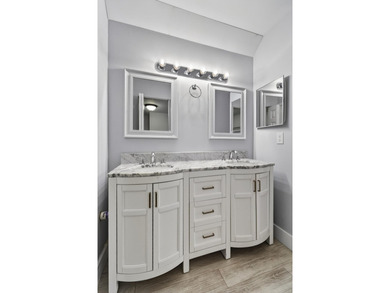 First-floor, fully updated condo with beautiful views and true on The Golf Club of Jupiter in Florida - for sale on GolfHomes.com, golf home, golf lot