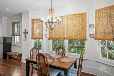 Tucked away in the charming Fish Camp community, this 3-bedroom on Orange Beach Golf Center in Alabama - for sale on GolfHomes.com, golf home, golf lot