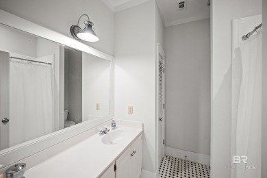 Tucked away in the charming Fish Camp community, this 3-bedroom on Orange Beach Golf Center in Alabama - for sale on GolfHomes.com, golf home, golf lot