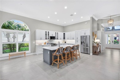 Discover the pinnacle of luxury living in this beautifully on West Bay Beach and Golf Club in Florida - for sale on GolfHomes.com, golf home, golf lot