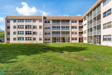 55+ Community, Bldg 186 unit 307, 3rd floor with golf Views from on Sunrise Lakes Phase IV Golf Course in Florida - for sale on GolfHomes.com, golf home, golf lot