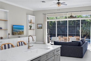 Discover the pinnacle of luxury living in this beautifully on West Bay Beach and Golf Club in Florida - for sale on GolfHomes.com, golf home, golf lot