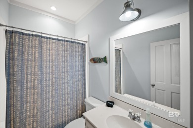 Tucked away in the charming Fish Camp community, this 3-bedroom on Orange Beach Golf Center in Alabama - for sale on GolfHomes.com, golf home, golf lot