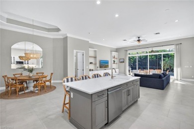 Discover the pinnacle of luxury living in this beautifully on West Bay Beach and Golf Club in Florida - for sale on GolfHomes.com, golf home, golf lot
