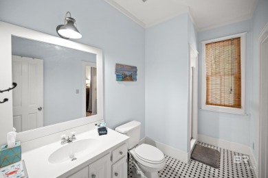 Tucked away in the charming Fish Camp community, this 3-bedroom on Orange Beach Golf Center in Alabama - for sale on GolfHomes.com, golf home, golf lot
