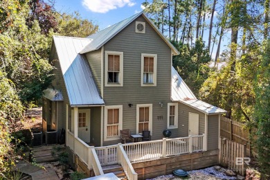 Tucked away in the charming Fish Camp community, this 3-bedroom on Orange Beach Golf Center in Alabama - for sale on GolfHomes.com, golf home, golf lot