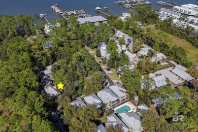 Tucked away in the charming Fish Camp community, this 3-bedroom on Orange Beach Golf Center in Alabama - for sale on GolfHomes.com, golf home, golf lot