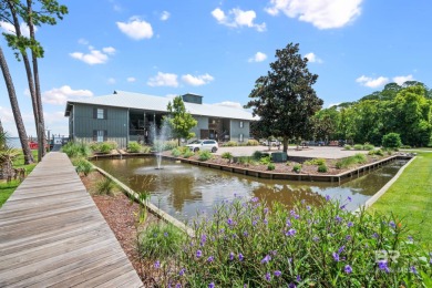 Tucked away in the charming Fish Camp community, this 3-bedroom on Orange Beach Golf Center in Alabama - for sale on GolfHomes.com, golf home, golf lot