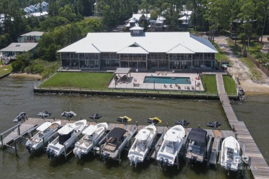Tucked away in the charming Fish Camp community, this 3-bedroom on Orange Beach Golf Center in Alabama - for sale on GolfHomes.com, golf home, golf lot
