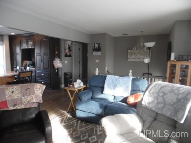 Charming 3-Bedroom, 2-Bath Bi-Level Home on the Golf Course! on Escanaba Country Club in Michigan - for sale on GolfHomes.com, golf home, golf lot