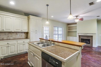 This immaculate 3-bedroom, 2-bathroom home boasts a spacious 1 on Castlewoods Golf Club in Mississippi - for sale on GolfHomes.com, golf home, golf lot