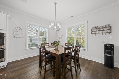 Nestled in the prestigious Hasentree Country Club community on Hasentree Club in North Carolina - for sale on GolfHomes.com, golf home, golf lot