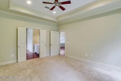 This immaculate 3-bedroom, 2-bathroom home boasts a spacious 1 on Castlewoods Golf Club in Mississippi - for sale on GolfHomes.com, golf home, golf lot