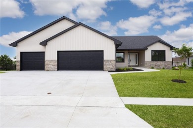 Boasting nearly 3200 finished square feet, this residence in the on Hunters Ridge Golf Course in Iowa - for sale on GolfHomes.com, golf home, golf lot