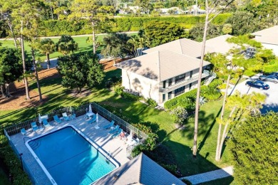 Welcome to this beautifully updated second-floor residence on Quail Ridge Golf Course and Country Club in Florida - for sale on GolfHomes.com, golf home, golf lot