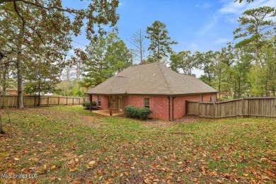 This immaculate 3-bedroom, 2-bathroom home boasts a spacious 1 on Castlewoods Golf Club in Mississippi - for sale on GolfHomes.com, golf home, golf lot