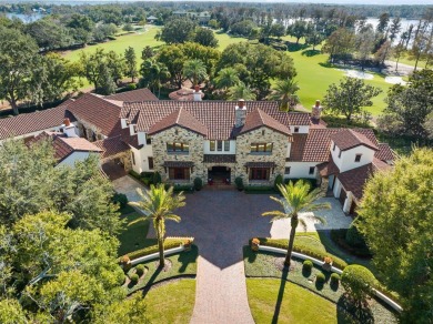 Welcome to this grand residence nestled on a sprawling 1.17 acre on Isleworth Golf and Country Club in Florida - for sale on GolfHomes.com, golf home, golf lot