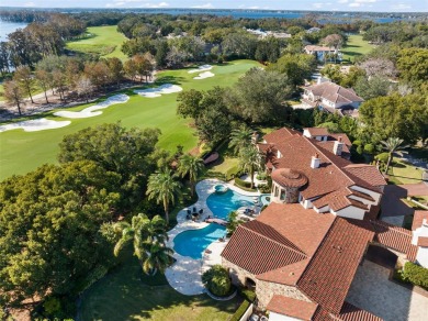 Welcome to this grand residence nestled on a sprawling 1.17 acre on Isleworth Golf and Country Club in Florida - for sale on GolfHomes.com, golf home, golf lot